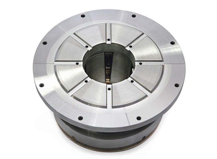 Tilt pad journal bearing with fixed profile thrust bearing