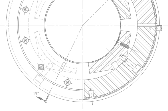 Half-section diagram of integral rib tilt pad journal bearing