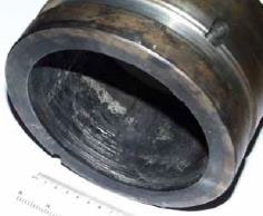 Black scab bearing damage on journal bearing inside bore